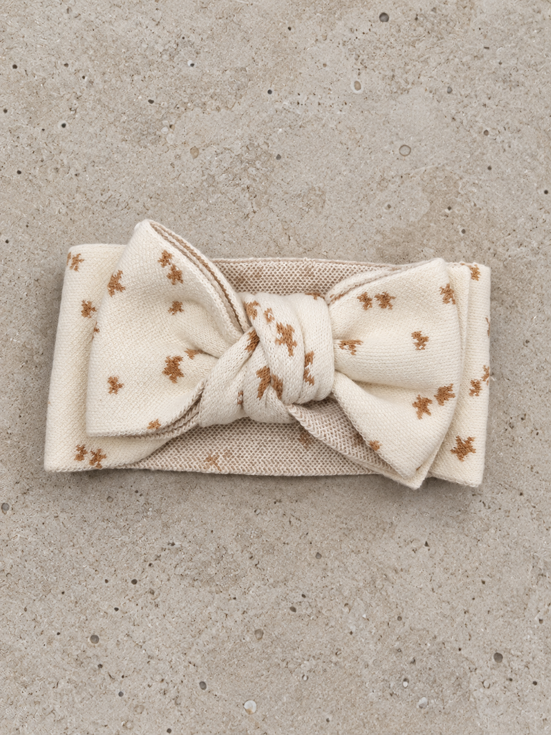 KNITTED TOPKNOT HEADBAND NORTH STAR
